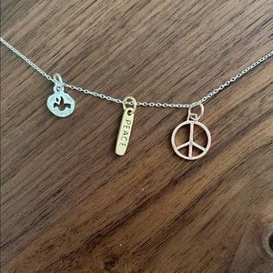 Cute peace necklace - peace sign, dove and the word peace, on silver chain